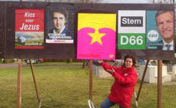 SP plakt posters weer vrolijk terug