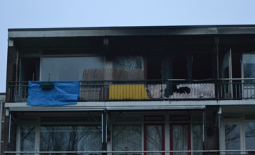 'Brand appartementencomplex in woning drugsdealer'